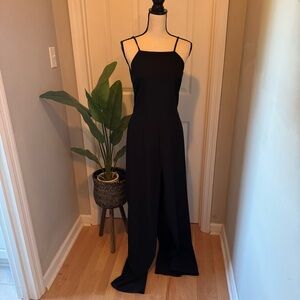 Chic Black Sleeveless Jumpsuit. Size L. NWT